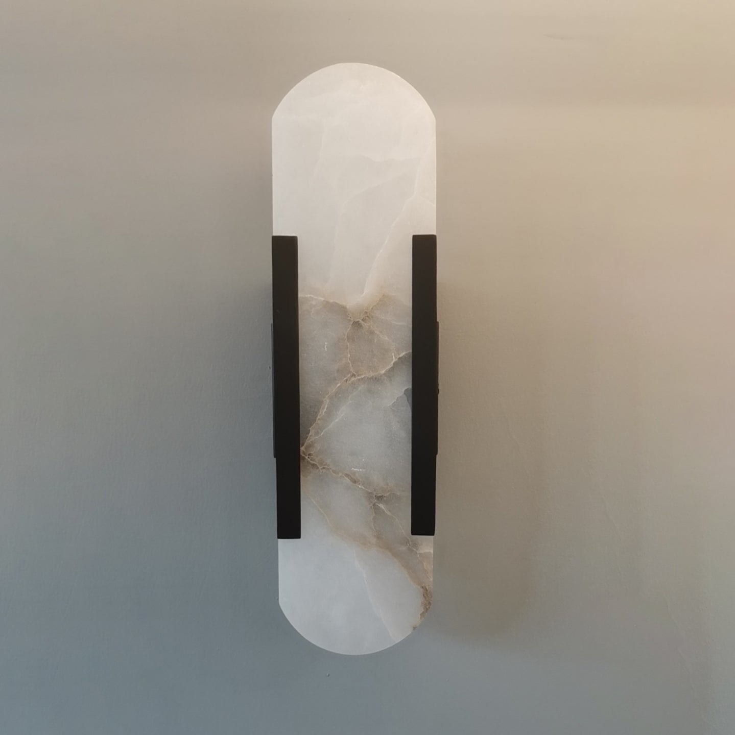 Contemporary Oval Marble Wall Sconce With Soft Vertical Led Ambient Lighting