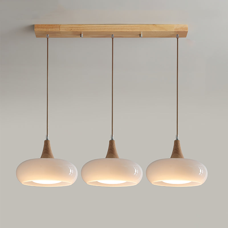 Modern Amber Glass And Round Wood Accent Pendant Light With Metal Frame
