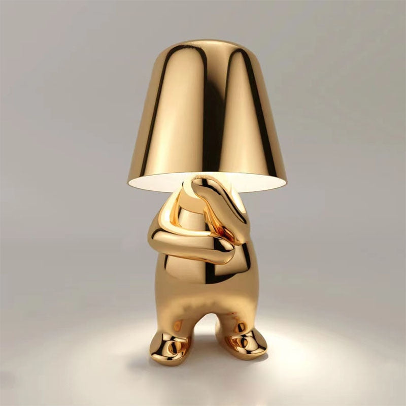 Reflective Metallic Table Lamp With Sculptural Seated Base And Dome Shade