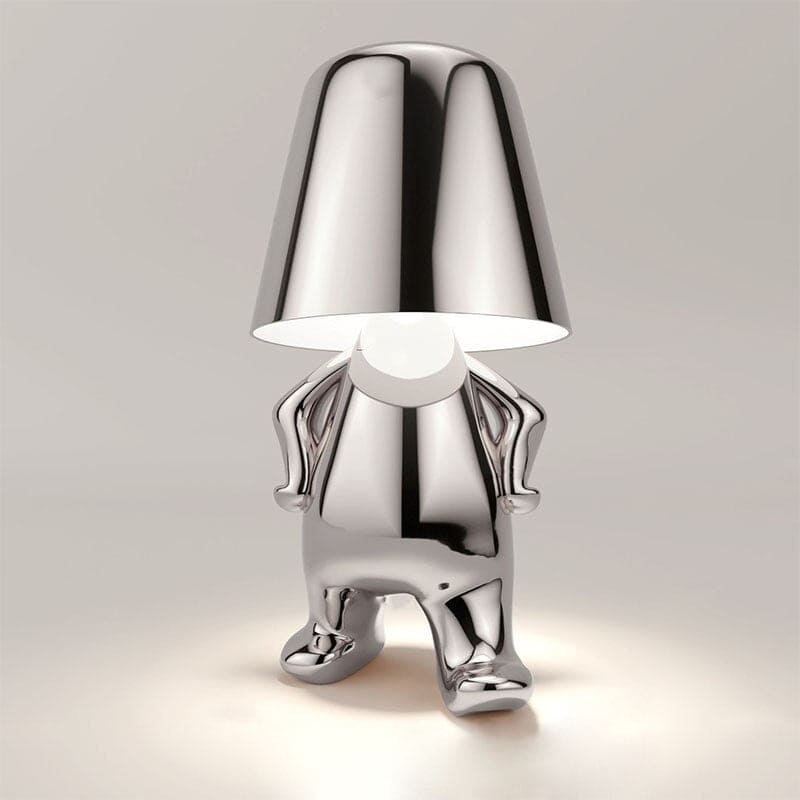 Reflective Metallic Table Lamp With Sculptural Seated Base And Dome Shade